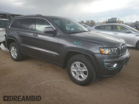 2017 Jeep Grand Cherokee Laredo with VIN 1C4RJFAG9HC653648, listed as a Copart auction lot 63049635 with 72,428 mi miles and Salvage title. Bid and sale history available at DreamBid. Image 4.