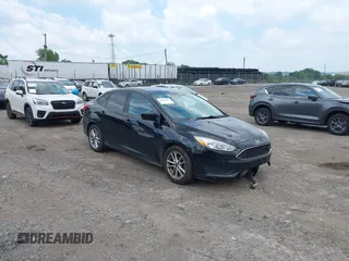 2018 Ford Focus SE with VIN 1FADP3FE5JL318316, listed as a IAAI auction lot 42612295 with 95,288 mi miles and . Bid and sale history available at DreamBid. Image 1.