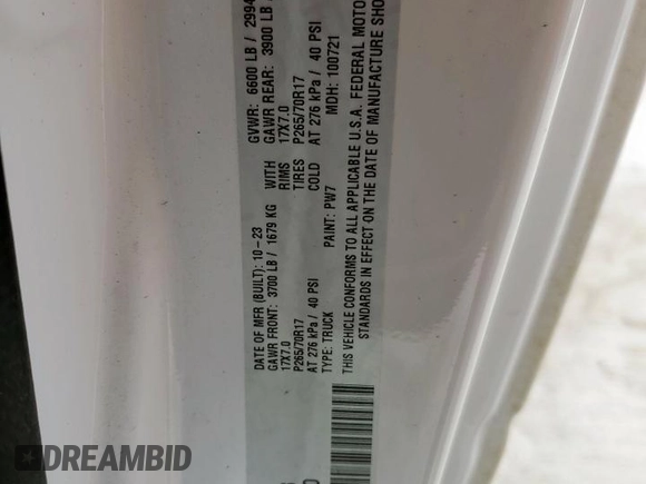 2023 Ram 1500 Tradesman with VIN 3C6JR6DG6PG671268, listed as a Copart auction lot 59573325 with 65,993 mi miles and Salvage title. Bid and sale history available at DreamBid. Image 13.