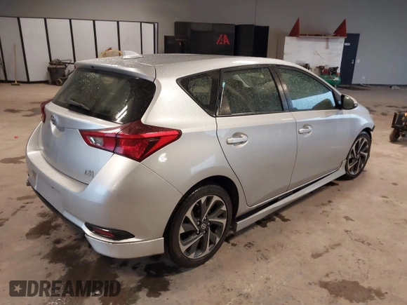 2016 Scion iM with VIN JTNKARJE7GJ519342, listed as a IAAI auction lot 41719786 with 94,191 mi miles. Bid and sale history available at carsss.com. Image 4.