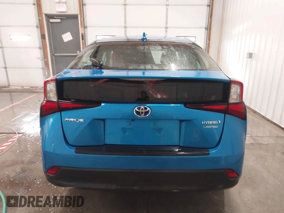 2021 Toyota Prius L Eco with VIN JTDKAMFU9M3135117, listed as a IAAI auction lot 41579736 with 35,795 mi miles and . Bid and sale history available at DreamBid. Image 17.