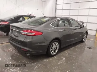2018 Ford Fusion Energi SE with VIN 3FA6P0PU3JR203714, listed as a IAAI auction lot 41698507 with 168,609 mi miles. Bid and sale history available at carsss.com. Image 4.