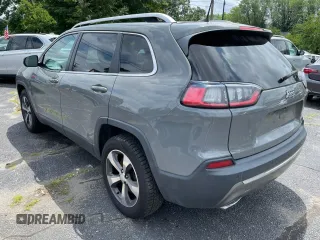 2020 Jeep Cherokee Limited with VIN 1C4PJMDXXLD562415, listed as a Copart auction lot 65097625 with 142,343 mi miles and Clean title. Bid and sale history available at DreamBid. Image 3.