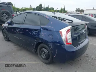 2014 Toyota Prius Four with VIN JTDKN3DU7E1779813, listed as a IAAI auction lot 42395989 with 148,626 mi miles and . Bid and sale history available at DreamBid. Image 3.