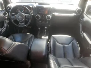 2015 Jeep Wrangler Unlimited Rubicon z VIN 1C4BJWFG2FL530863, wystawiony jako Copart lot #56345965 z przebiegiem 149 754 mil mil oraz Szkoda całkowita • Salvage title. Historia ofert i sprzedaży dostępna na DreamBid. Obrazek 8.
