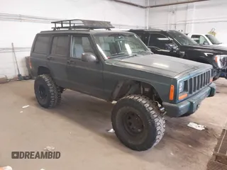1998 Jeep Cherokee Sport z VIN 1J4FJ68S0WL107406, wystawiony jako IAAI lot #42187428 z przebiegiem 214 854 mil mil oraz . Historia ofert i sprzedaży dostępna na DreamBid. Obrazek 1.
