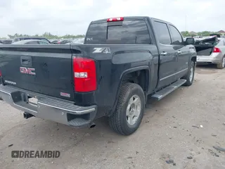 2015 GMC Sierra 1500 SLT with VIN 3GTU2VEC6FG383913, listed as a IAAI auction lot 41888606 with 122,181 mi miles and . Bid and sale history available at DreamBid. Image 4.