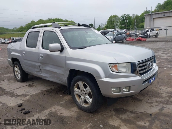 2012 Honda Ridgeline RTL with VIN 5FPYK1F58CB454385, listed as a IAAI auction lot 42212805 with 207,874 mi miles and . Bid and sale history available at DreamBid. Image 1.