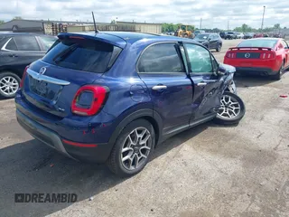 2021 FIAT 500X Trekking with VIN ZFBNF3B10MP945509, listed as a IAAI auction lot 42299963 with 35,474 mi miles and . Bid and sale history available at DreamBid. Image 4.