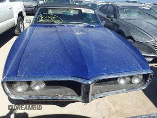 1968 Pontiac Firebird z VIN 223678U118793, wystawiony jako Copart lot #76205674 z przebiegiem 82 021 mil mil oraz Szkoda całkowita • Salvage title. Historia ofert i sprzedaży dostępna na DreamBid. Obrazek 5.