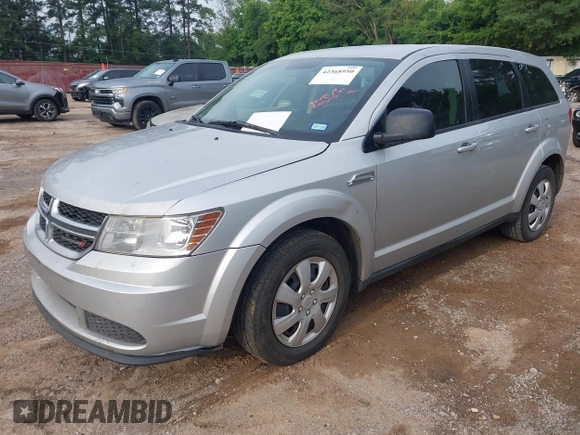 2014 Dodge Journey American Value with VIN 3C4PDCAB5ET198704, listed as a IAAI auction lot 42368950 with 220,615 mi miles and . Bid and sale history available at DreamBid. Image 2.
