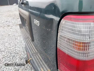1999 Toyota 4Runner SR5 z VIN JT3HN86R4X0256990, wystawiony jako IAAI lot #41314366 z przebiegiem 362 268 mil mil oraz . Historia ofert i sprzedaży dostępna na DreamBid. Obrazek 13.