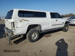 2001 Dodge 2500 z VIN 1B7KF23621J521123, wystawiony jako Copart lot #49670345 z przebiegiem 248 027 mil mil oraz Szkoda całkowita • Salvage title. Historia ofert i sprzedaży dostępna na DreamBid. Obrazek 3.