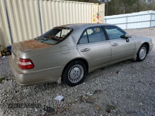 2000 Infiniti Q45 z VIN JNKBY31A0YM301297, wystawiony jako Copart lot #74672884 z przebiegiem 171 263 mil mil oraz Szkody całkowita. Historia ofert i sprzedaży dostępna na DreamBid. Obrazek 3.
