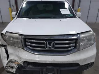 2015 Honda Pilot EX-L with VIN 5FNYF4H59FB023814, listed as a IAAI auction lot 41161235 with 216,437 mi miles and . Bid and sale history available at carsss.com. Image 12.