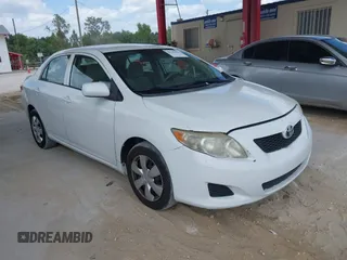 2010 Toyota Corolla with VIN 1NXBU4EE0AZ335239, listed as a IAAI auction lot 42155710 with 215,134 mi miles. Bid and sale history available at carsss.com. Image 1.