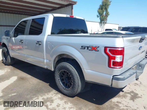 2018 Ford F-150 XL with VIN 1FTEW1CP6JKF36573, listed as a IAAI auction lot 42314415 with 121,240 mi miles and . Bid and sale history available at DreamBid. Image 3.