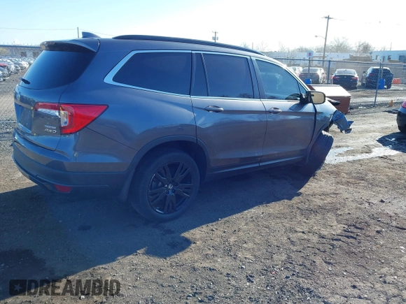 2021 Honda Pilot Special Edition with VIN 5FNYF6H25MB041029, listed as a IAAI auction lot 41894494 with 35,576 mi miles and . Bid and sale history available at DreamBid. Image 4.
