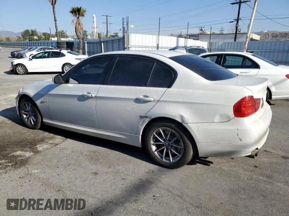 2010 BMW 3 Series 328i with VIN WBAPH5C52AA439642, listed as a Copart auction lot 42956485 with 82,960 mi miles and Salvage title. Bid and sale history available at DreamBid. Image 2.