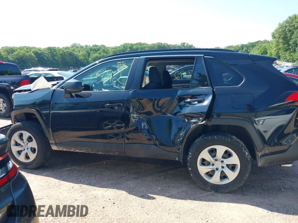 2019 Toyota RAV4 LE with VIN JTMH1RFV9KD515999, listed as a IAAI auction lot 42635692 with 87,345 mi miles and . Bid and sale history available at DreamBid. Image 14.