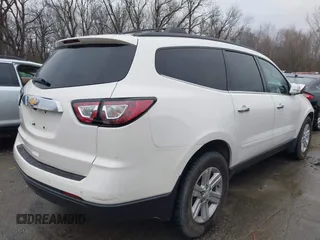 2013 Chevrolet Traverse LT with VIN 1GNKVGKD7DJ176487, listed as a IAAI auction lot 41211283 with 146,844 mi miles and . Bid and sale history available at DreamBid. Image 4.