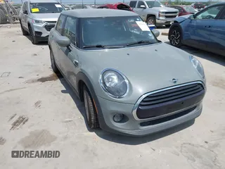 2021 MINI Hardtop 4 Door Oxford Edition with VIN WMWXU7C09M2P17351, listed as a IAAI auction lot 42330197 with 51,628 mi miles and . Bid and sale history available at DreamBid. Image 1.