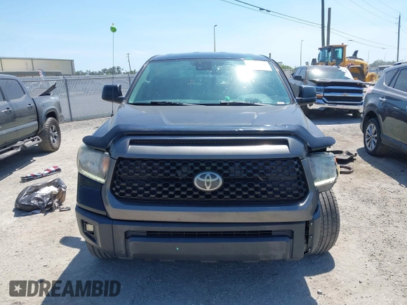 2019 Toyota Tundra SR with VIN 5TFUY5F13KX852912, listed as a IAAI auction lot 42327399 with 124,193 mi miles and . Bid and sale history available at DreamBid. Image 12.