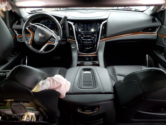 2020 Cadillac Escalade Luxury with VIN 1GYS4BKJ8LR202660, listed as a Copart auction lot 52859945 with 46,503 mi miles and Salvage title. Bid and sale history available at DreamBid. Image 8.