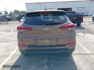 2016 Hyundai Tucson SE with VIN KM8J23A4XGU180300, listed as a IAAI auction lot 42123067 with 123,804 mi miles. Bid and sale history available at carsss.com. Image 16.
