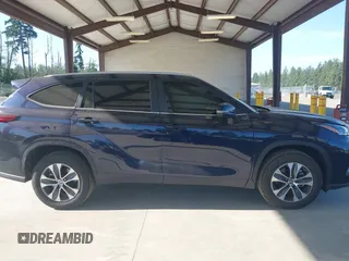 2023 Toyota Highlander L with VIN 5TDKDRAH3PS526958, listed as a IAAI auction lot 42397325 with 10,430 mi miles and . Bid and sale history available at DreamBid. Image 14.