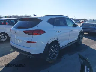 2019 Hyundai Tucson Ultimate with VIN KM8J3CAL2KU903389, listed as a IAAI auction lot 41421264 with 73,326 mi miles. Bid and sale history available at carsss.com. Image 4.