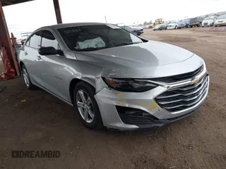 2019 Chevrolet Malibu LS z VIN 1G1ZB5ST7KF140268, wystawiony jako IAAI lot #41811560 z przebiegiem 92 461 mil mil oraz . Historia ofert i sprzedaży dostępna na DreamBid. Obrazek 1.