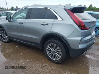 2025 Cadillac XT4 FWD Premium Luxury z VIN 1GYFZCR44SF122443, wystawiony jako IAAI lot #42414279 z przebiegiem 11 023 mil mil oraz . Historia ofert i sprzedaży dostępna na DreamBid. Obrazek 3.