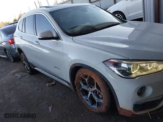 2018 BMW X1 xDrive28i with VIN WBXHT3C32J5K29627, listed as a IAAI auction lot 40995212 with 64,162 mi miles. Bid and sale history available at carsss.com. Image 13.