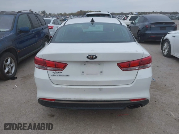 2016 Kia Optima LX with VIN KNAGT4L39G5104726, listed as a IAAI auction lot 40950914 with 128,728 mi miles. Bid and sale history available at carsss.com. Image 16.