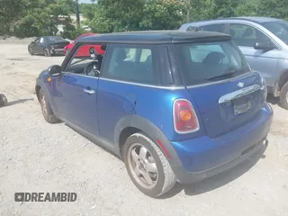 2008 MINI Hardtop with VIN WMWMF33538TT65479, listed as a IAAI auction lot 42489393 with 114,520 mi miles and . Bid and sale history available at DreamBid. Image 3.