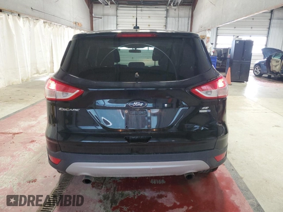 2016 Ford Escape SE with VIN 1FMCU9GX5GUB67512, listed as a Copart auction lot 53002675 with 141,033 mi miles and Salvage Title. Bid and sale history available at carsss.com. Image 6.