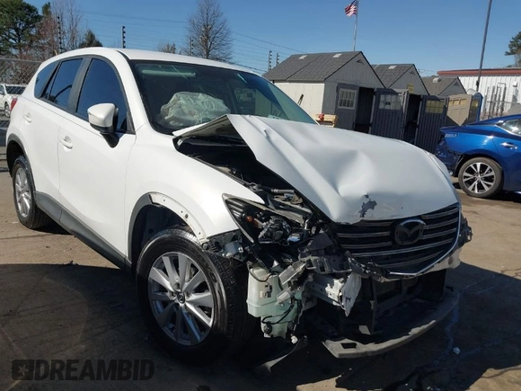 2016 Mazda CX-5 Sport with VIN JM3KE2BY9G0890587, listed as a IAAI auction lot 41685344 with 91,190 mi miles. Bid and sale history available at carsss.com. Image 1.