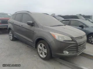 2014 Ford Escape SE with VIN 1FMCU0GXXEUA77765, listed as a IAAI auction lot 40158558 with NaN miles. Bid and sale history available at carsss.com. Image 1.