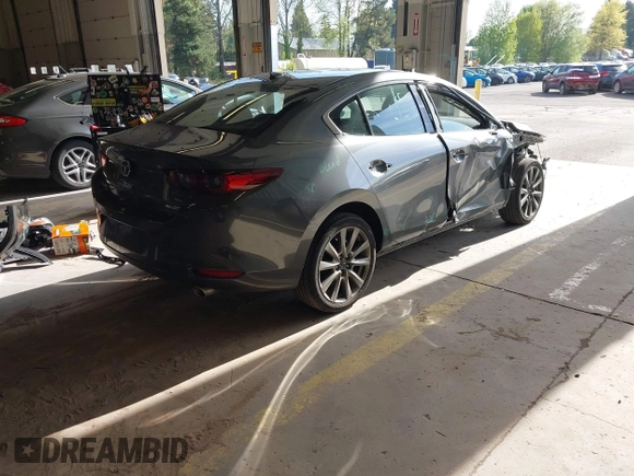 2023 Mazda 3 S Premium with VIN 3MZBPBDM5PM374492, listed as a IAAI auction lot 42025207 with 12,344 mi miles and . Bid and sale history available at DreamBid. Image 4.