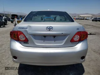 2010 Toyota Corolla with VIN 1NXBU4EEXAZ233494, listed as a Copart auction lot 64494725 with 129,452 mi miles and Salvage title. Bid and sale history available at DreamBid. Image 6.