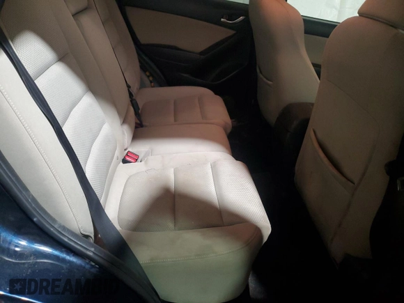 2016 Mazda CX-5 Touring z VIN JM3KE4CY4G0838908, wystawiony jako Copart lot #57961625 z przebiegiem 178 615 mil mil oraz Szkoda całkowita • Salvage title. Historia ofert i sprzedaży dostępna na DreamBid. Obrazek 11.