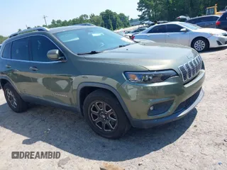 2019 Jeep Cherokee Latitude with VIN 1C4PJLCB9KD109451, listed as a IAAI auction lot 39941419 with 131,236 mi miles. Bid and sale history available at carsss.com. Image 1.