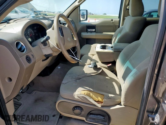 2007 Ford F-150 XLT with VIN 1FTRW12W37KB03263, listed as a Copart auction lot 61087375 with 167,585 mi miles and Salvage title. Bid and sale history available at DreamBid. Image 7.