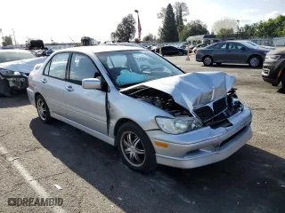 2003 Mitsubishi Lancer OZ-Rally with VIN JA3AJ86E43U032755, listed as a Copart auction lot 51342815 with 124,211 mi miles and Salvage Title. Bid and sale history available at carsss.com. Image 4.