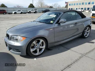 2011 BMW 1 Series 135i with VIN WBAUN7C59BVM24329, listed as a Copart auction lot 49263045 with 65,242 mi miles and Salvage Title. Bid and sale history available at DreamBid. Image 1.