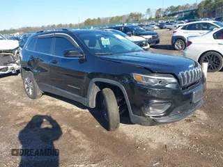 2019 Jeep Cherokee Latitude Plus with VIN 1C4PJMLB2KD261304, listed as a IAAI auction lot 41877500 with 76,442 mi miles and . Bid and sale history available at DreamBid. Image 1.