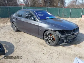 2007 BMW 3 Series 328xi with VIN WBAVC93587K031632, listed as a IAAI auction lot 41711350 with 184,703 mi miles. Bid and sale history available at carsss.com. Image 1.