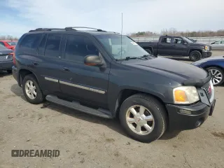 2003 GMC Envoy SLT with VIN 1GKDT13S232107429, listed as a Copart auction lot 48615135 with 245,956 mi miles and Clean Title. Bid and sale history available at carsss.com. Image 4.