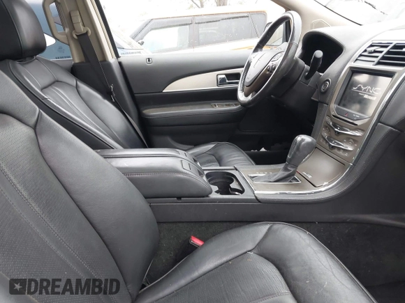 2012 Lincoln MKX with VIN 2LMDJ6JK7CBL11512, listed as a IAAI auction lot 41832419 with 127,485 mi miles. Bid and sale history available at carsss.com. Image 5.